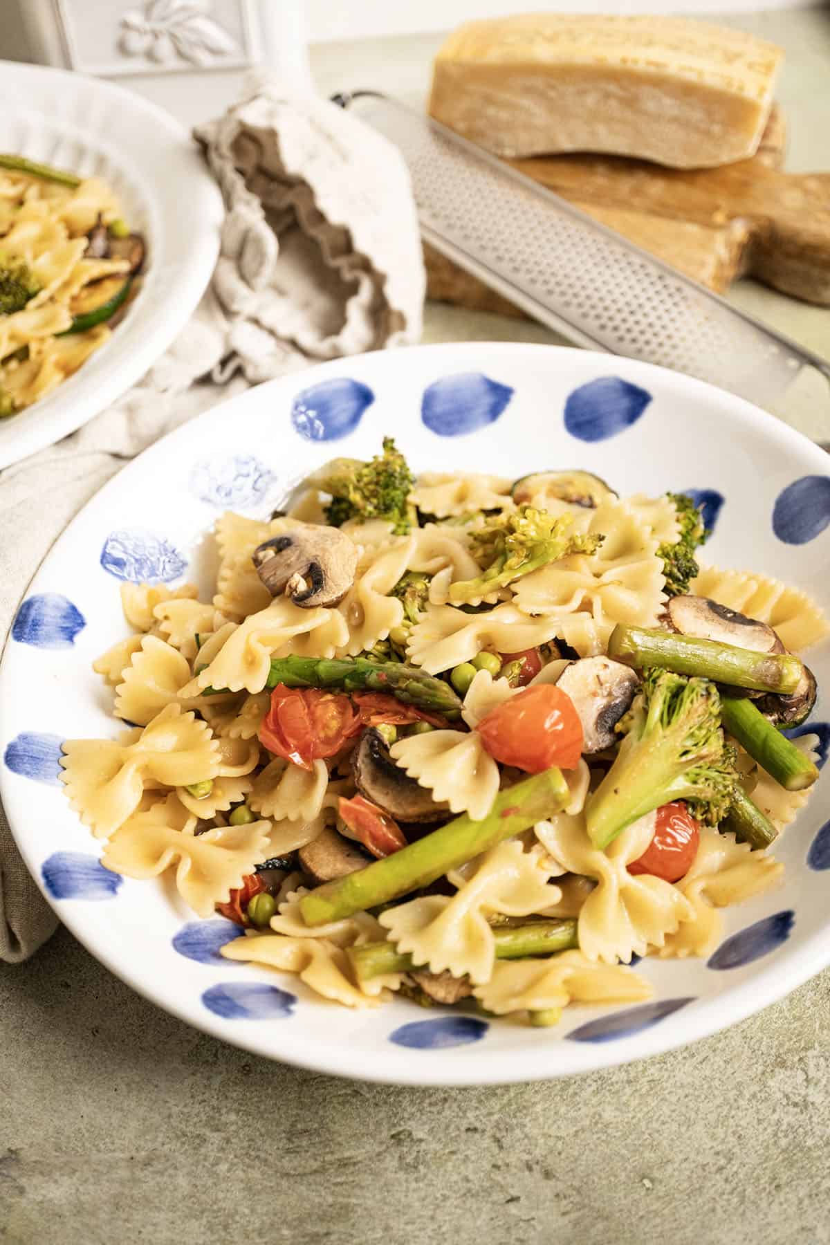 A bowl of pasta primavera.