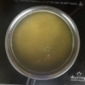 Boiling Pastina in a pot.