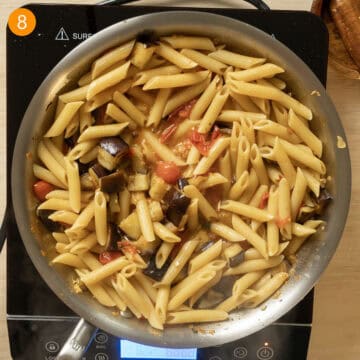 Pasta added to the sauce and tossed with the eggplant.