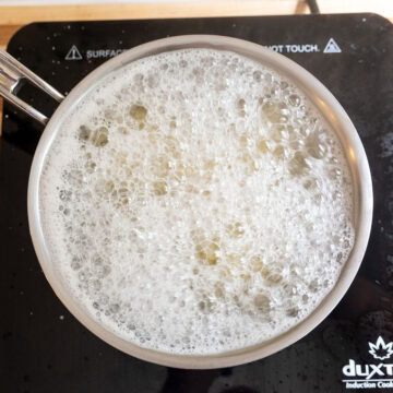 Boiling orzo.