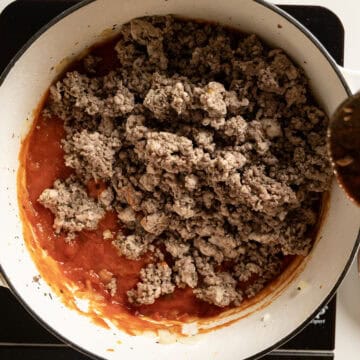 Meat added to the marinara sauce.
