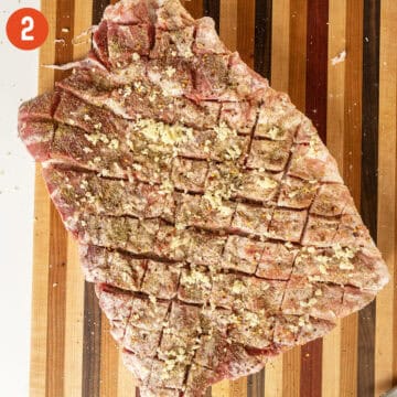 Seasoning porchetta.