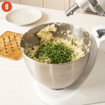 Chopped parsley combined with mashed potatoes.