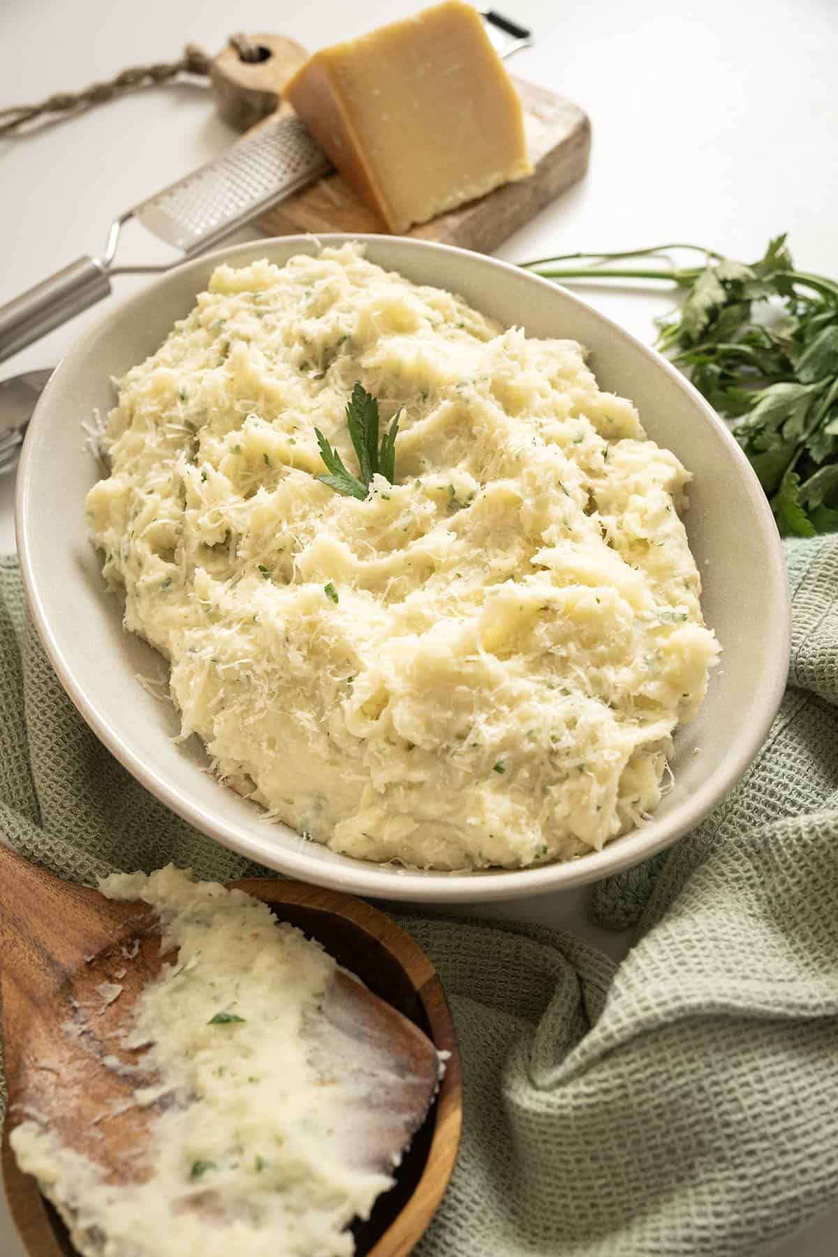 Garlic parmesan mashed potatoes in a bowl.