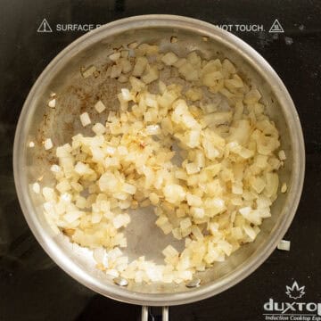 Sauteed onions in a pan.