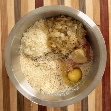 Ingredients for meatloaf in a bowl.