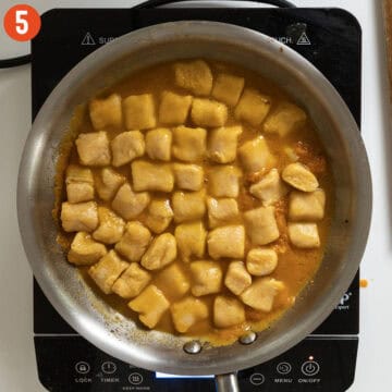 Gnocchi added to the creamy pumpkin sauce.