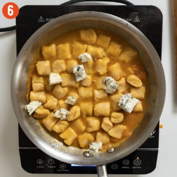 Gorgonzola added to the sauce.