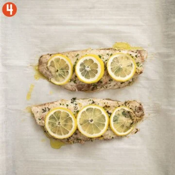 Baked red snapper finished on a baking tray.