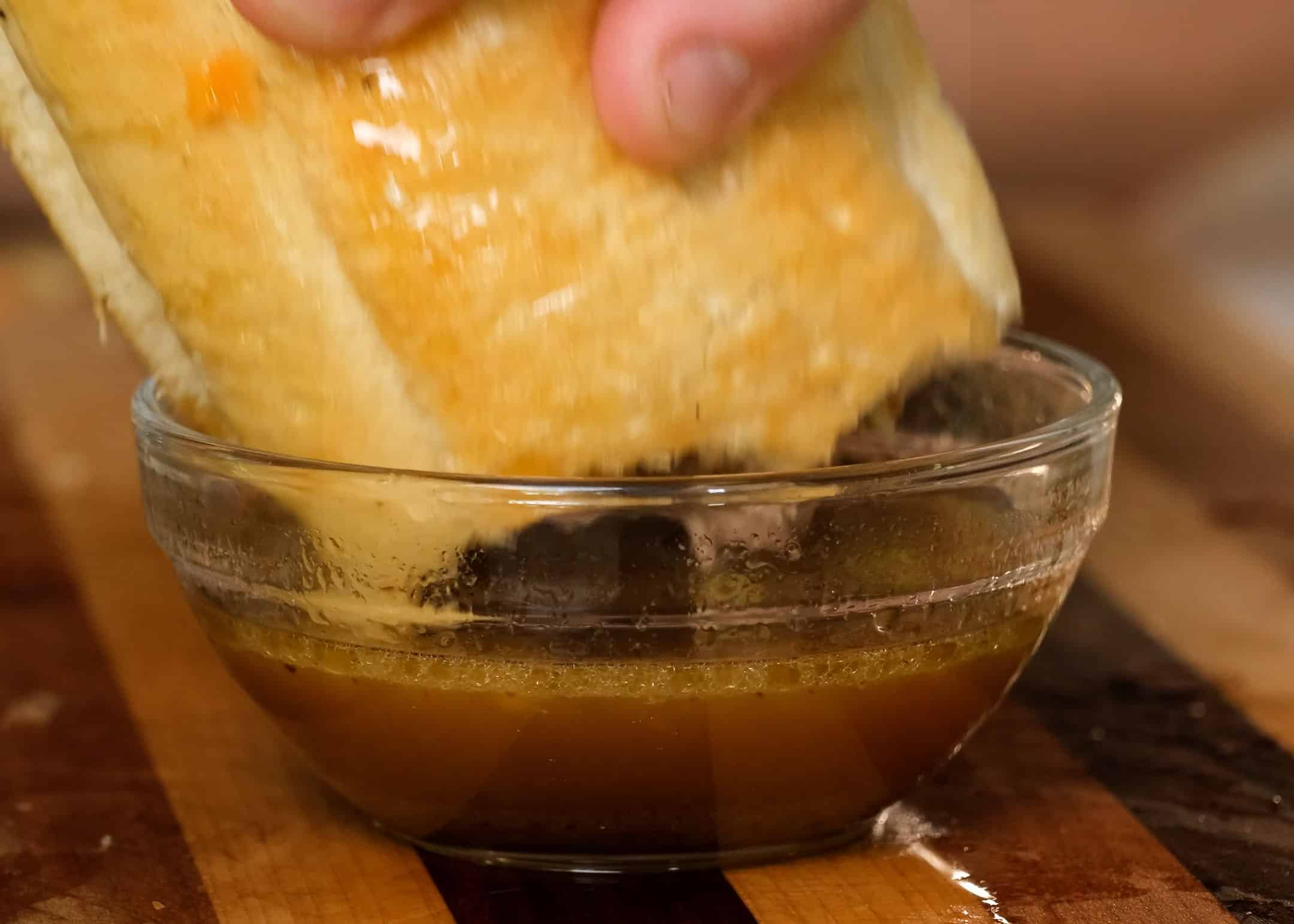 Italian beef sandwich dipped in au jus.