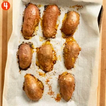 Sweet potatoes roasted on a sheet pan.
