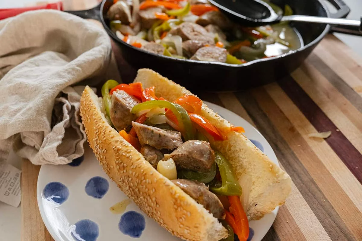 Sausage and peppers on a roll.