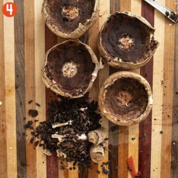 Cleaning out portobello mushrooms.