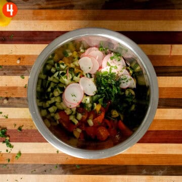 Combining vegetables and lentils.