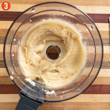 Pignoli cookie dough in a food processor.