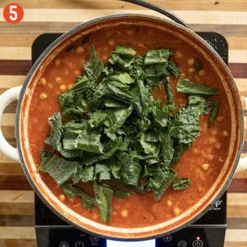 Kale added to the pot to wilt.
