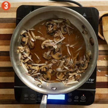 Simmering mushrooms and shallots in marsala wine.