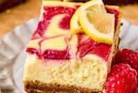 Zesty Lemon Raspberry Protein Cheesecake Bars