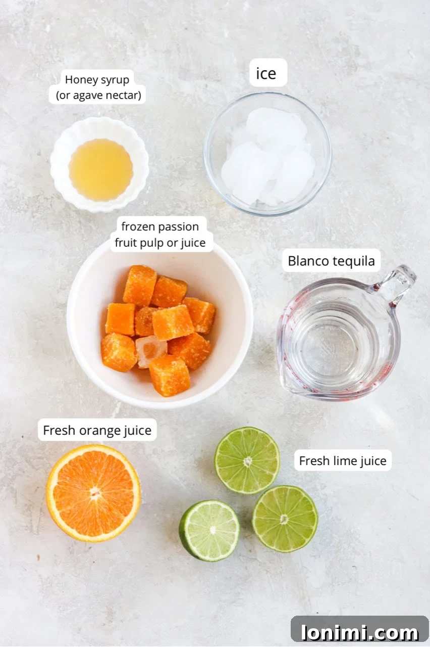 Various recipe ingredients, including passion fruit pulp, Blanco tequila, limes, oranges, and honey, neatly arranged in small bowls on a wooden surface.