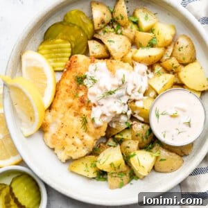 Gluten free fish and chips with pickles and tartar sauce