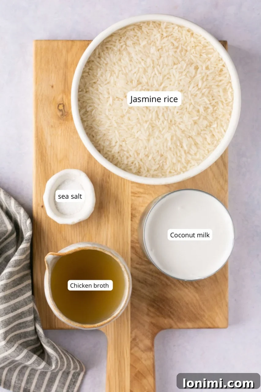Fluffy and Fragrant Instant Pot Coconut Rice 3 ingredients for this recipe in white nesting bowls on a wood cutting board