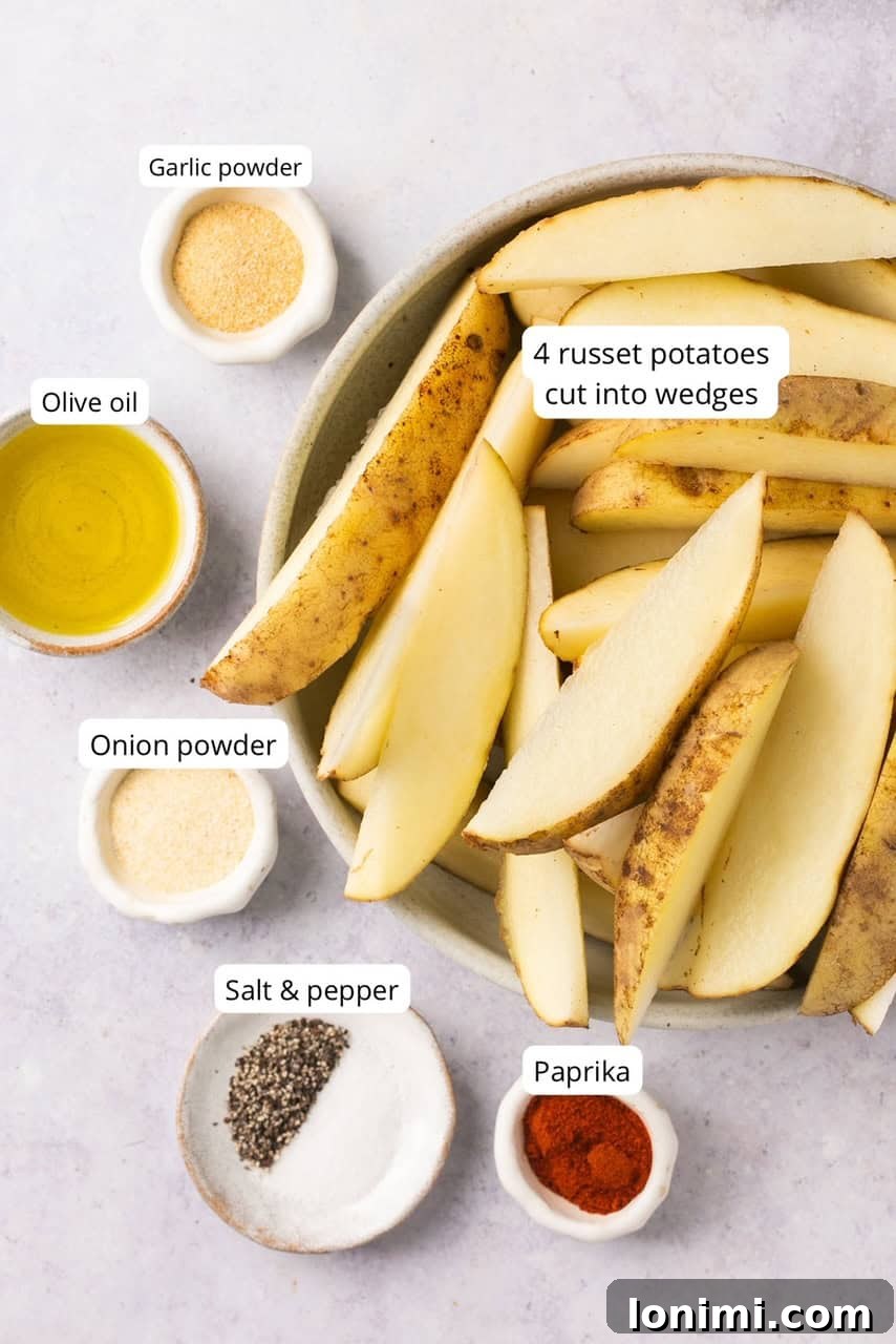 ingredients for air fryer potato wedges labeled including Russet potaotes, seasonings, and oil 