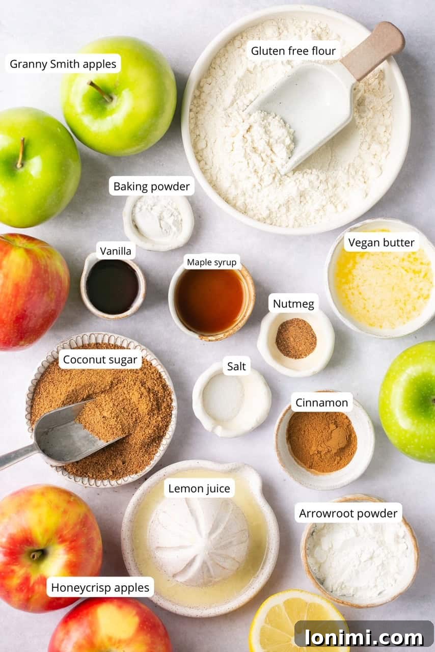 recipe ingredients laid out in nesting bowls and labeled for a healthy apple crumble