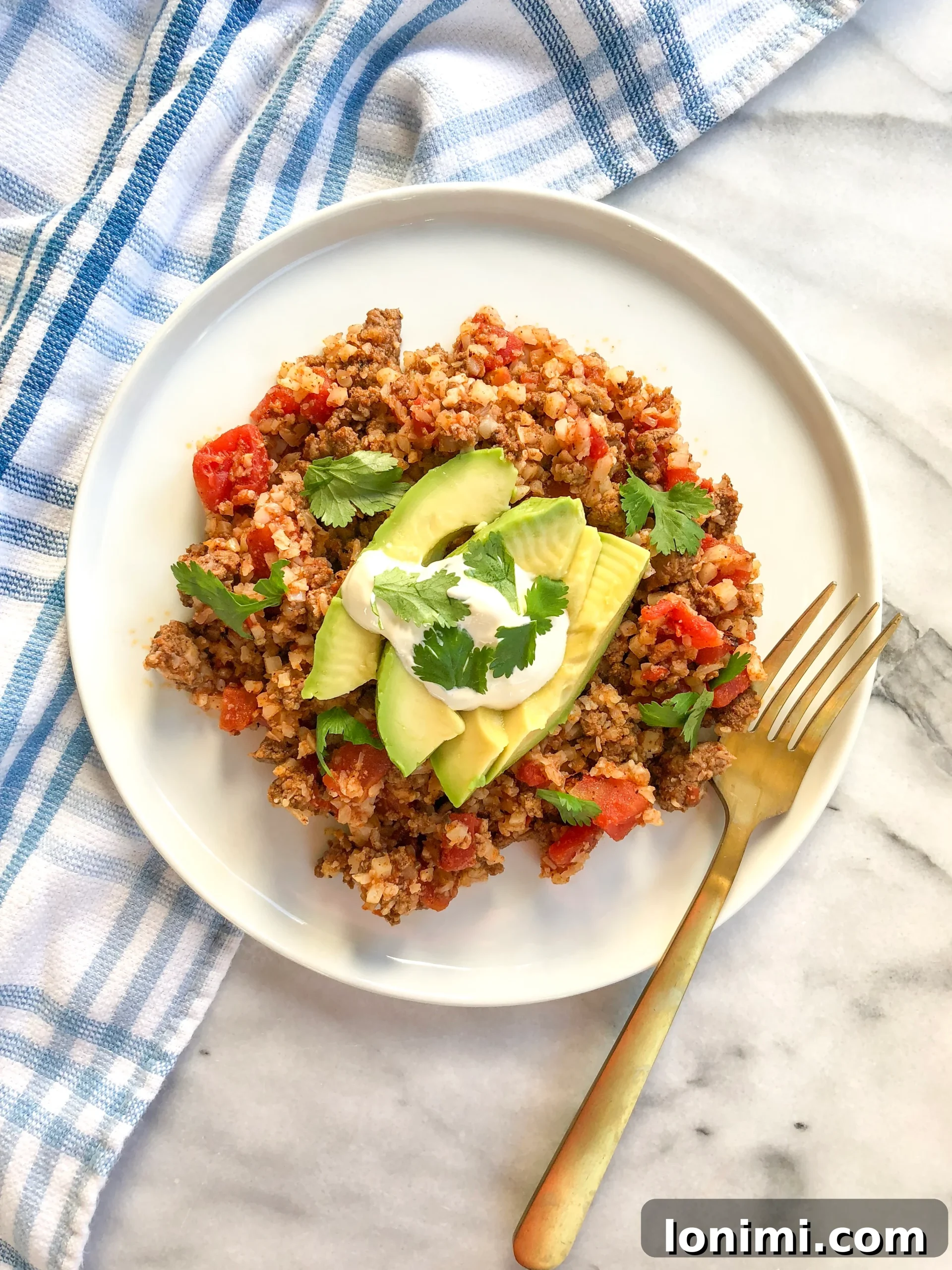 Whole30 Taco Skillet with fresh avocado and cilantro