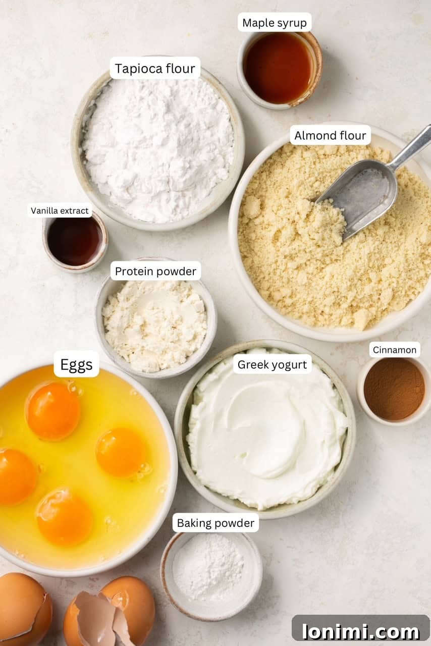ingredients for protein pancakes measured out in bowls