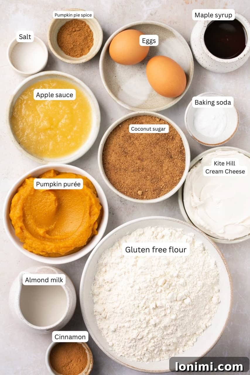 Simple Pumpkin Muffins with Velvety Dairy-Free Cream Cheese Frosting 3 Carefully arranged recipe ingredients in nesting bowls and labeled for easy identification.