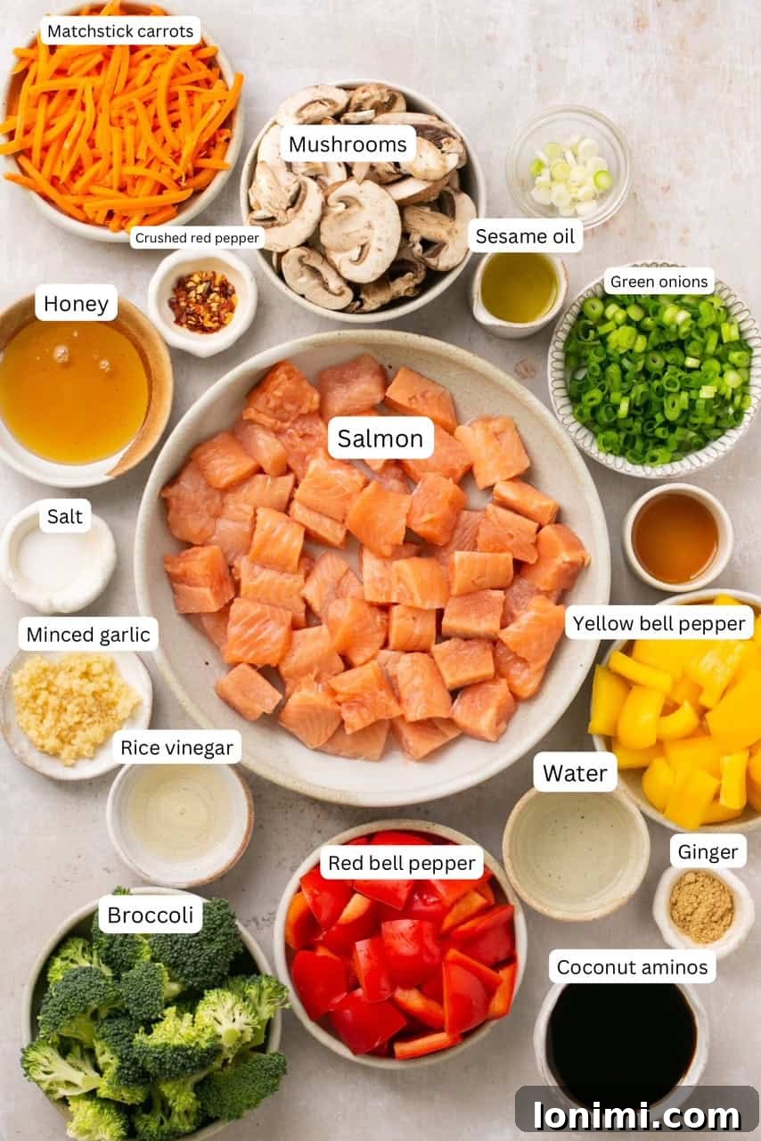 Effortless 30-Minute Gluten-Free Teriyaki Salmon Stir-Fry 3 Recipe ingredients for salmon stir fry neatly arranged in nesting bowls and labeled.