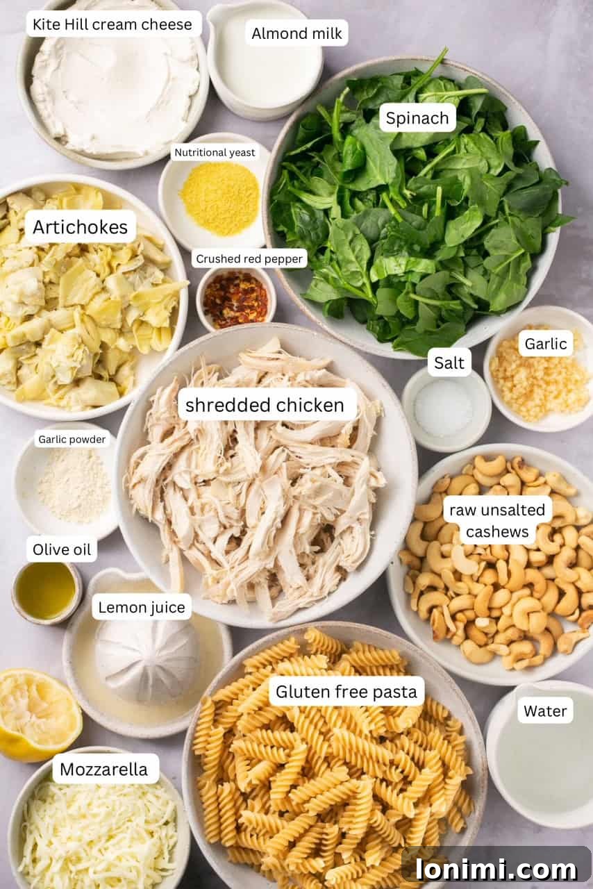 Spinach Artichoke Chicken Casserole Vegan Adaptable 3 Recipe ingredients laid out in nesting bowls and clearly labeled for easy identification.