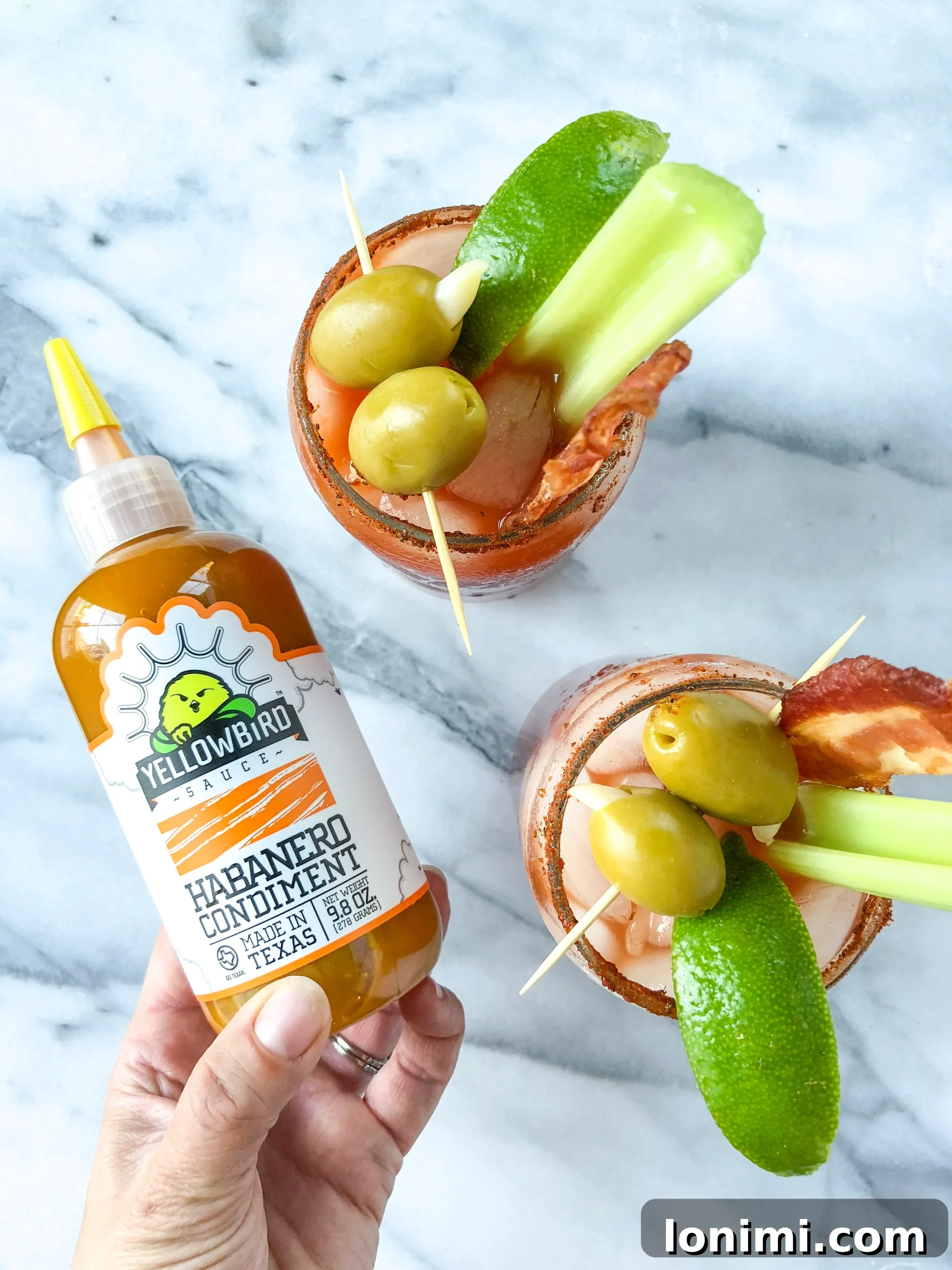 A close-up shot of a Habanero Bloody Mary, showcasing its rich texture and spicy appeal.