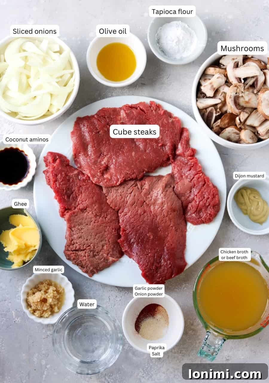 Effortless Tender Cube Steak 3 Ingredients for a healthy cube steak recipe, meticulously portioned out in various bowls and plates, ready for cooking.