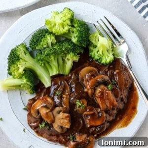 Effortless Tender Cube Steak 9 A healthy and flavorful cube steak recipe smothered with gluten-free caramelized onions and mushroom gravy, perfect for a quick dinner.