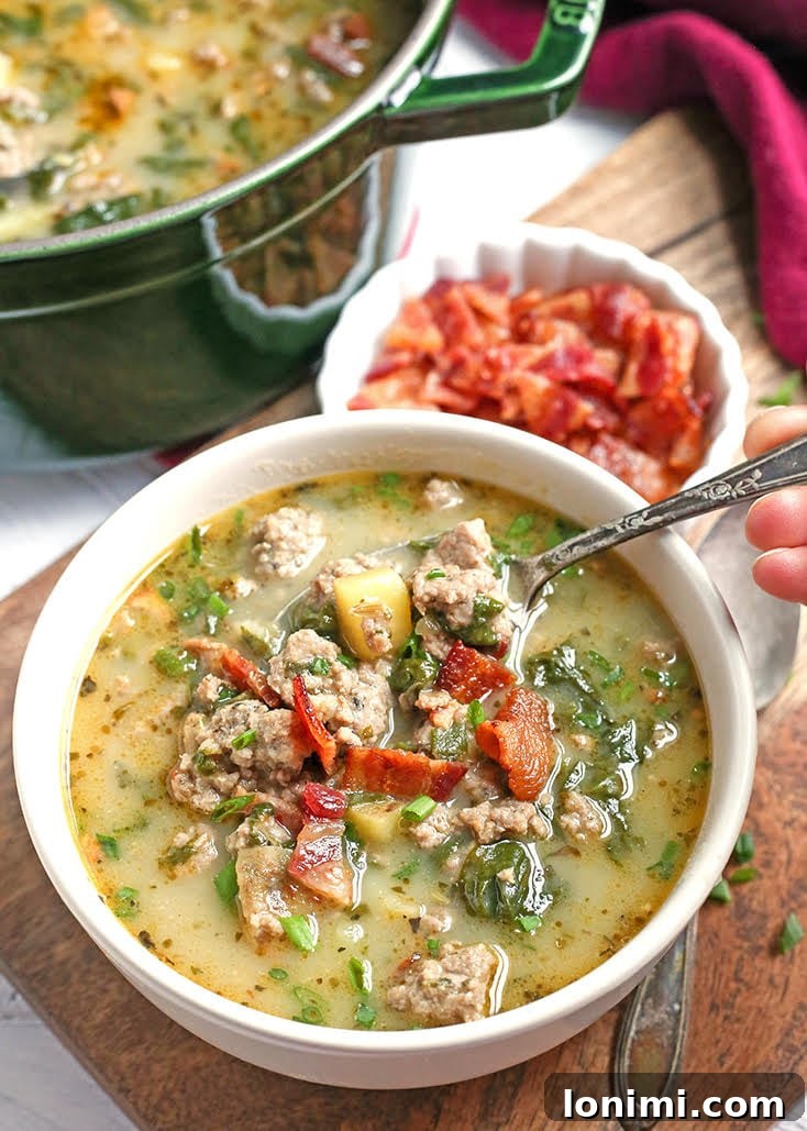 Creamy and savory Whole30 Zuppa Toscana with sausage, kale, and potatoes.