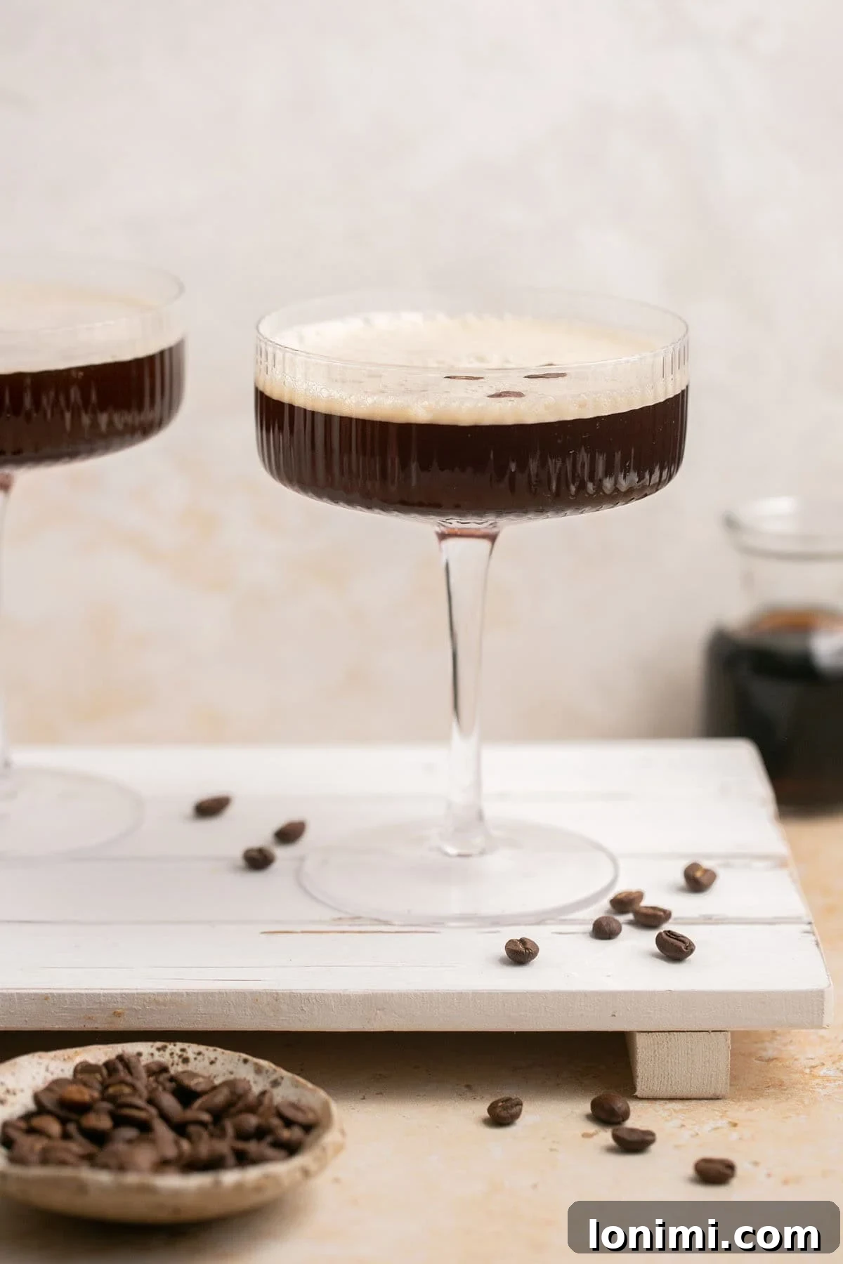 Espresso Martini Perfection The Kahlua Secret 6 two kahlua martinis on a palate with coffee beans