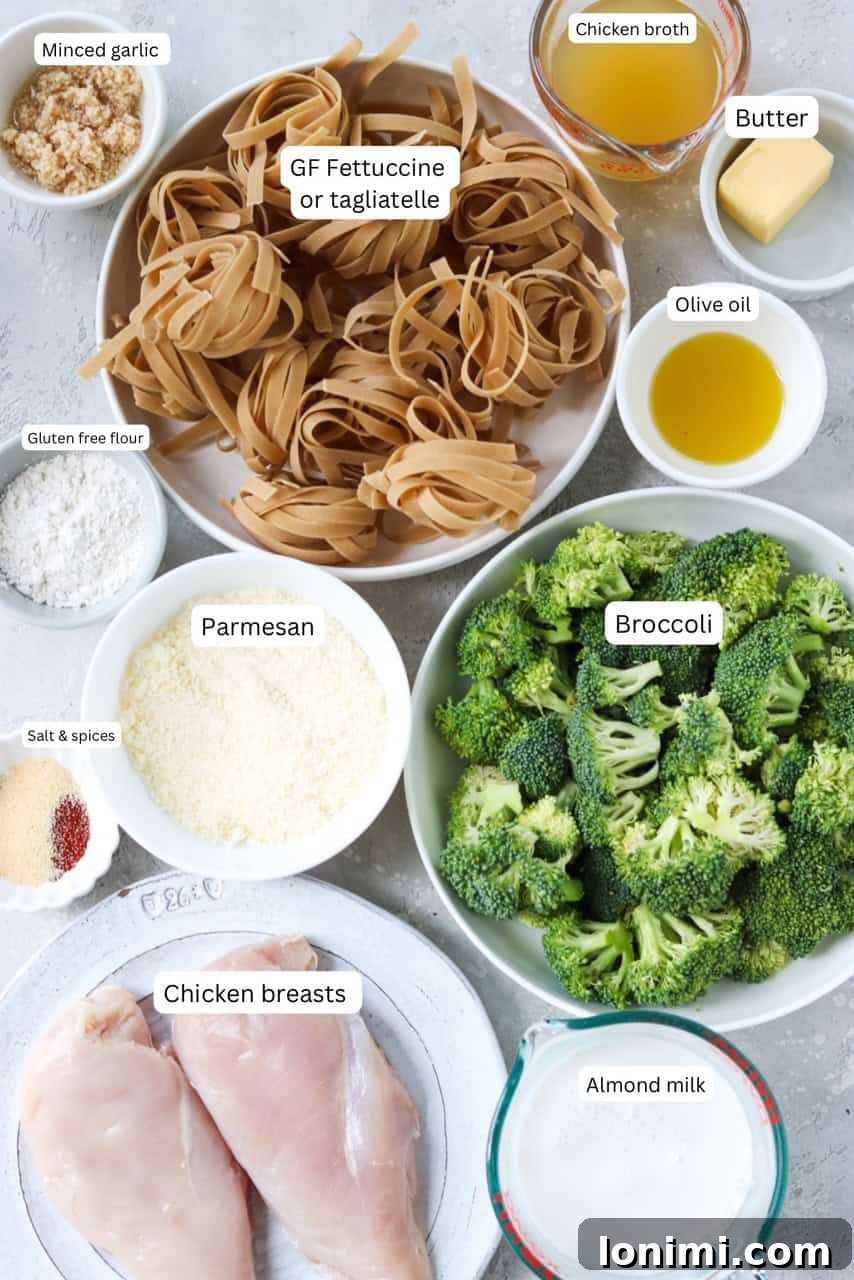 Ingredients for making gluten free chicken broccoli alfredo sauce without cream spread out in nesting bowls