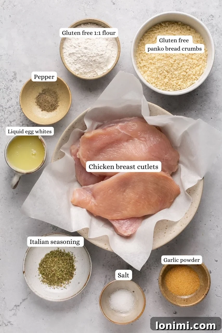 ingredients for air fryer chicken cutlets in nesting bowls 