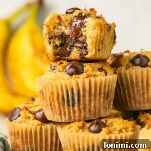 gluten free banana bread muffins stacked on top of each other