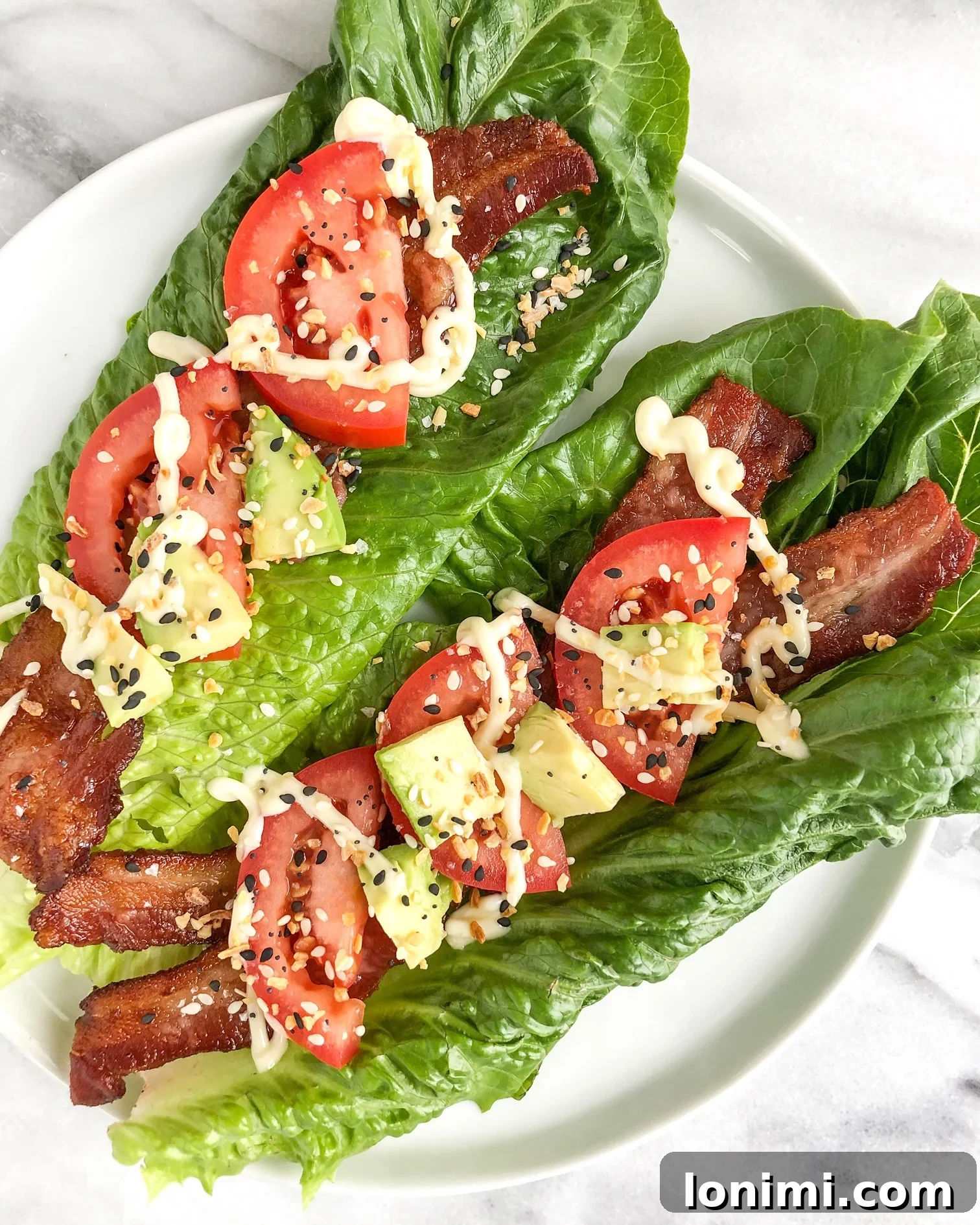 Effortless Crispy Baked Bacon 2 Crispy baked bacon strips arranged on a baking sheet, ready to be served.