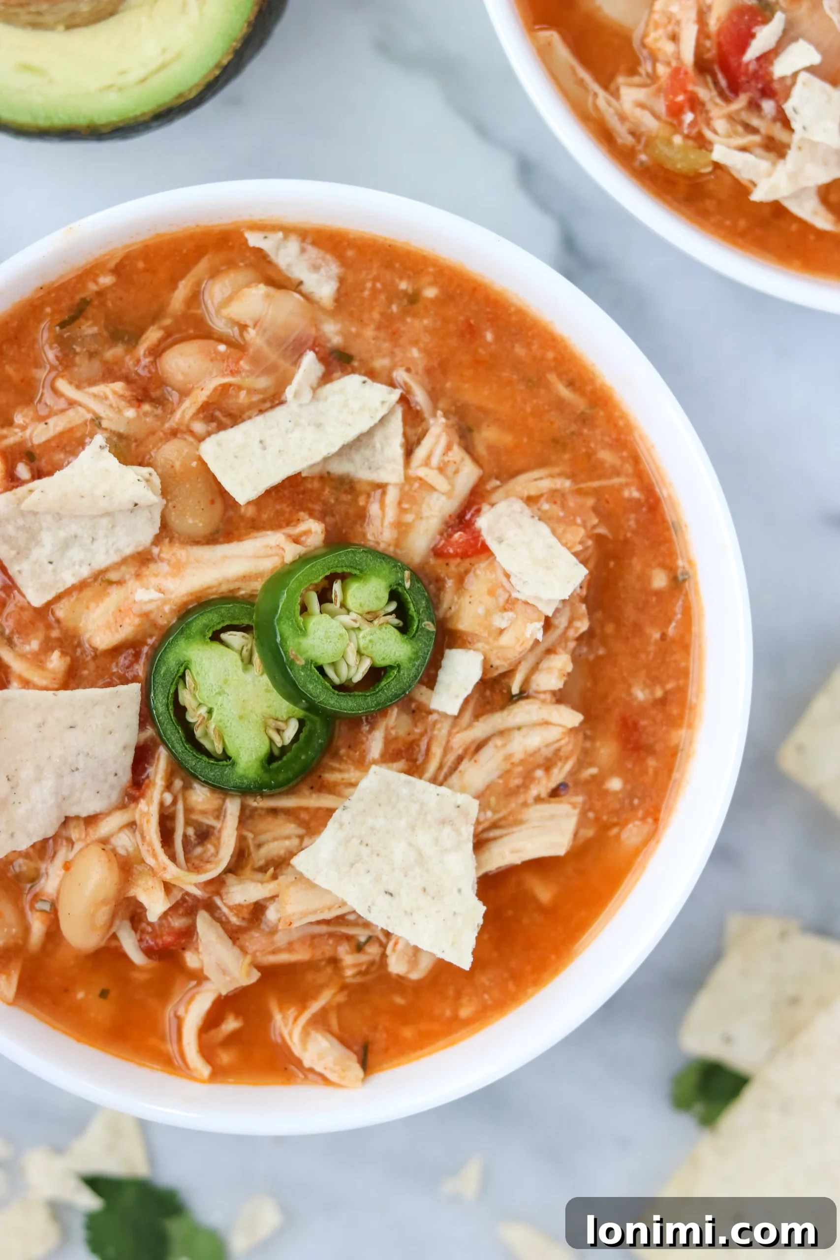 Dreamy Dairy Free Chicken Tortilla Chili 3 Close-up of Creamy Tortilla Chicken Chili, showing shredded chicken and beans
