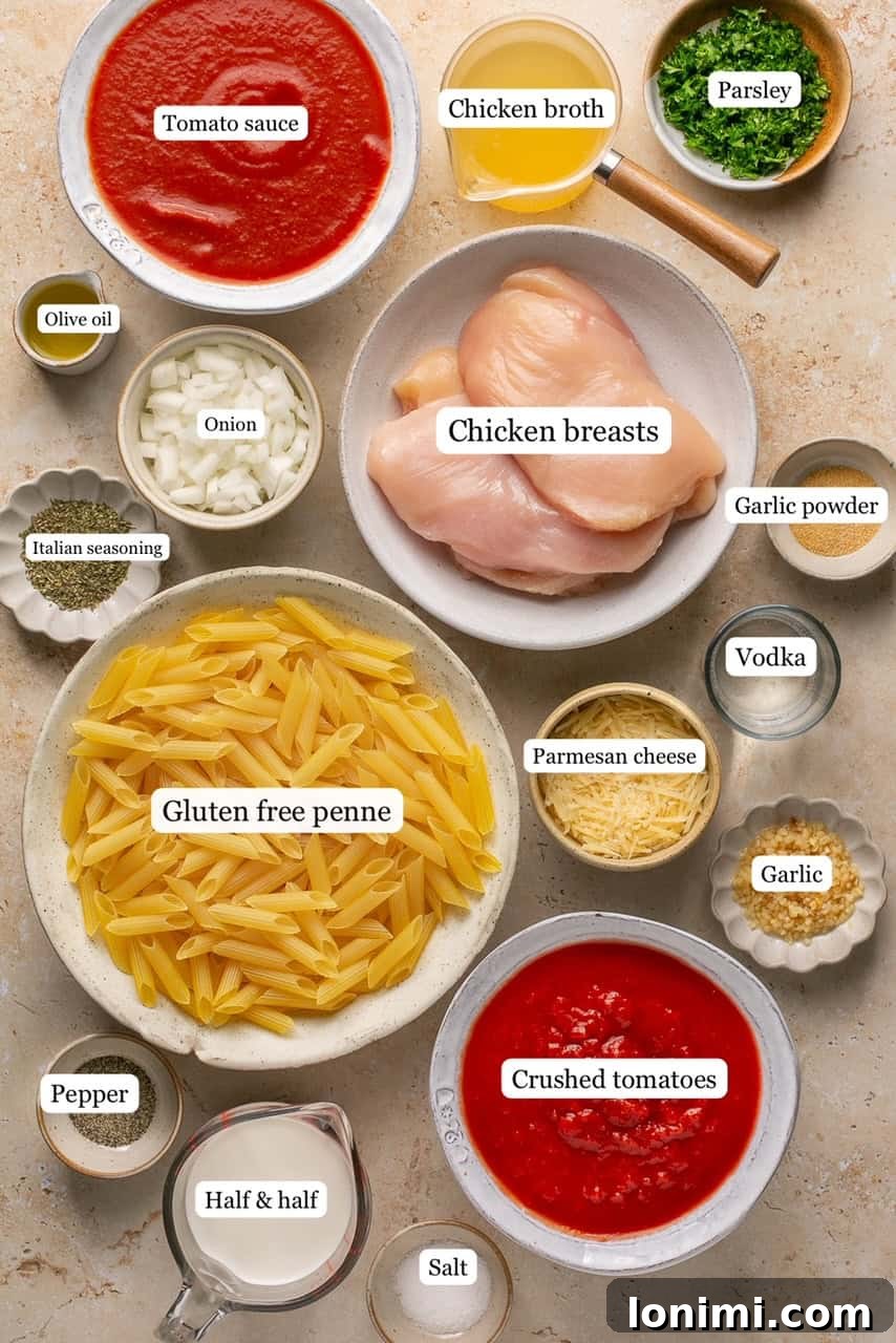 Ingredients needed to make penne alla vodka with chicken in nesting bowls