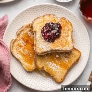 protein french toast on a plate topped with chia jam