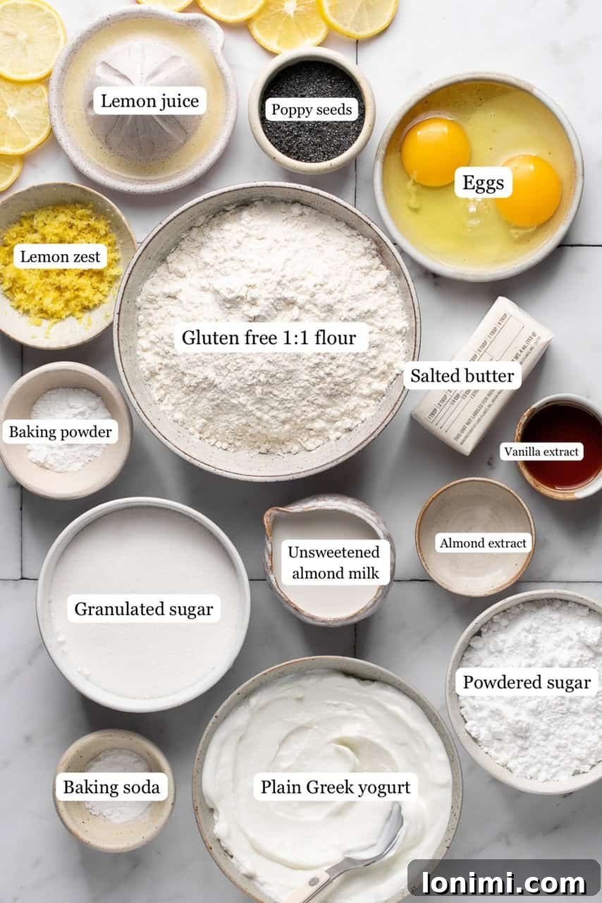 Small bowls containing all the fresh and pantry ingredients for making lemon poppyseed muffins, neatly labeled for easy identification.