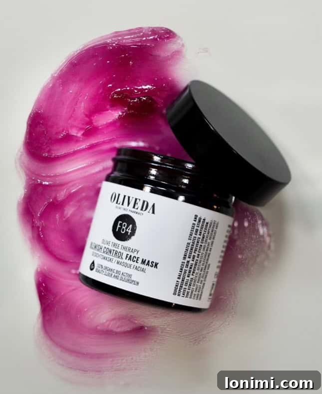 Oliveda Skincare Unveiled: Your Essential Guide and Honest Review 5 a container of purple face mask open and smeared on a white background