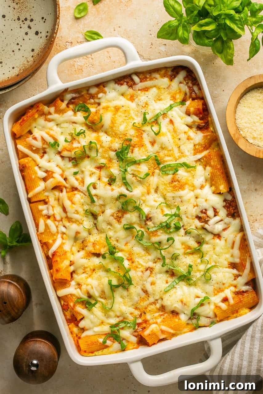 Effortless Cheesy Lasagna Bake 6 An inviting overhead shot of the baked Lazy Lasagna in a casserole dish, fresh out of the oven, with melted and bubbling cheese.