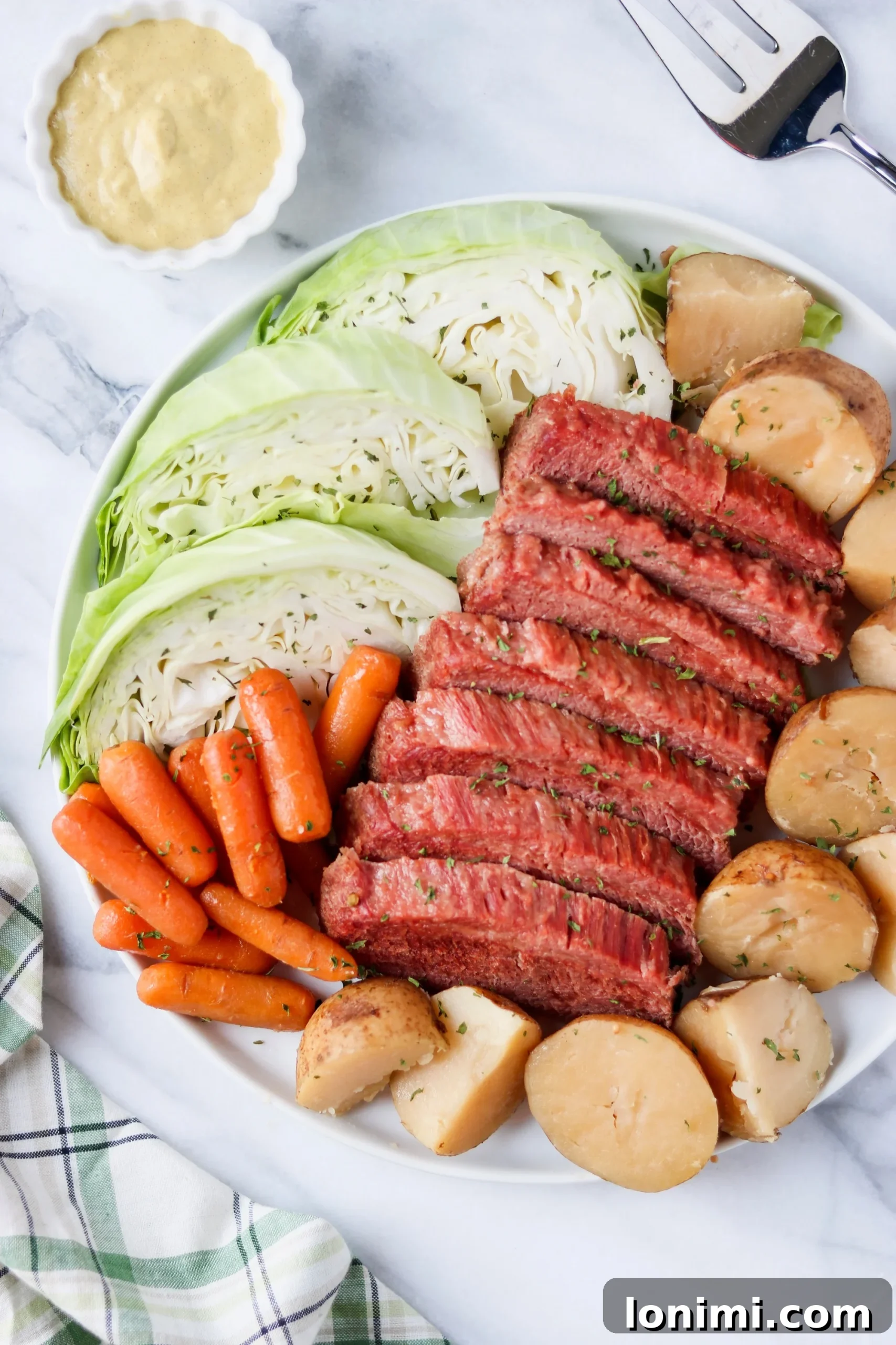 Platter of Sliced Corned Beef and Cooked Vegetables Ready to Serve