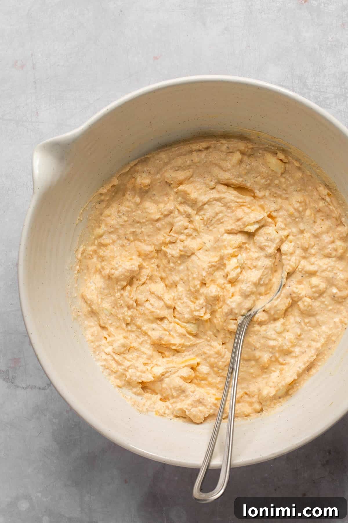 Decadent Mayo-Free Spinach Artichoke Dip 7 All creamy ingredients combined and mixed smoothly in a bowl