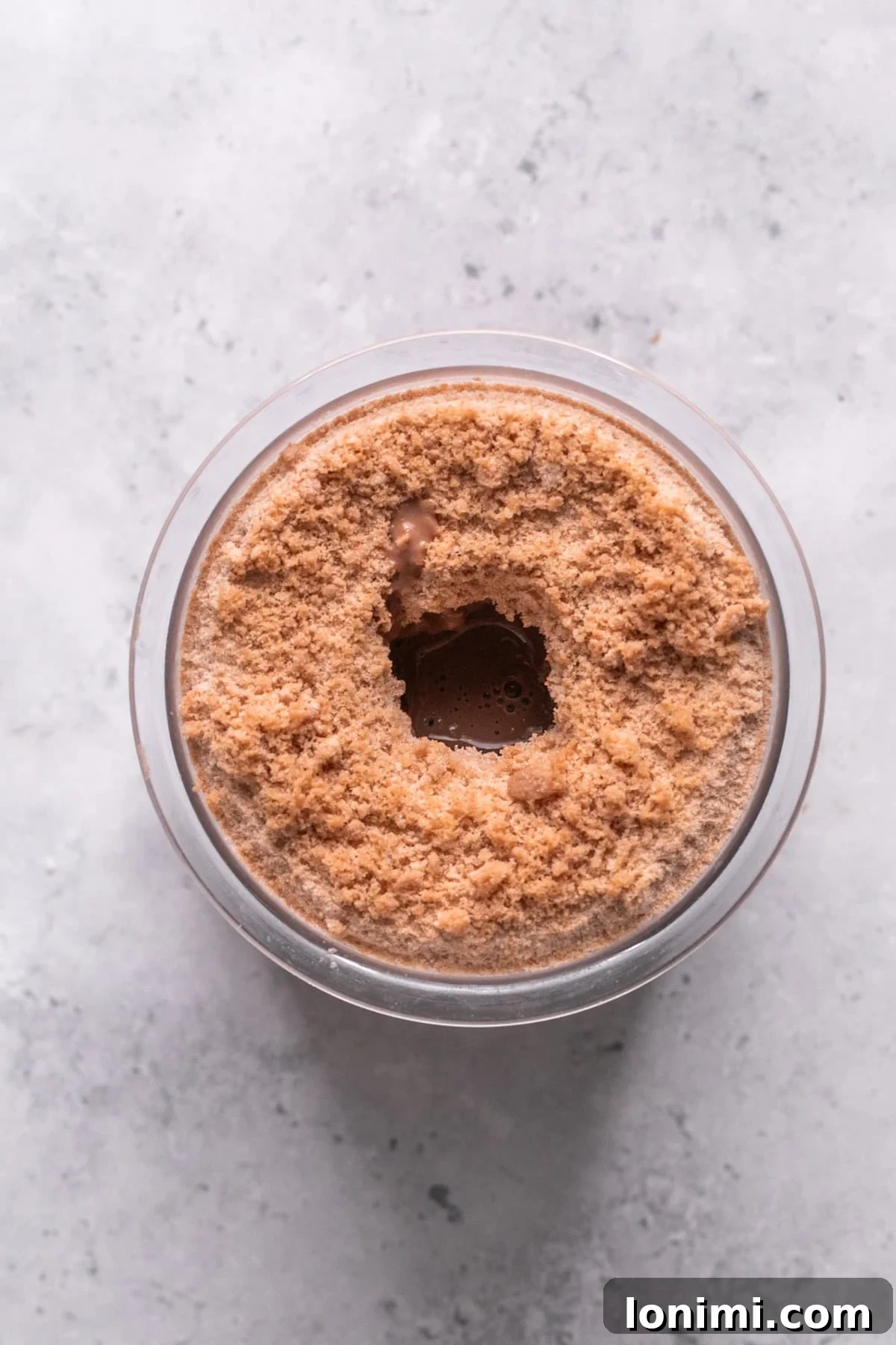 Easy Ninja Creami Protein Ice Cream with 4 Ingredients and 24g Protein 7 Frozen ice cream ingredients before it is blended